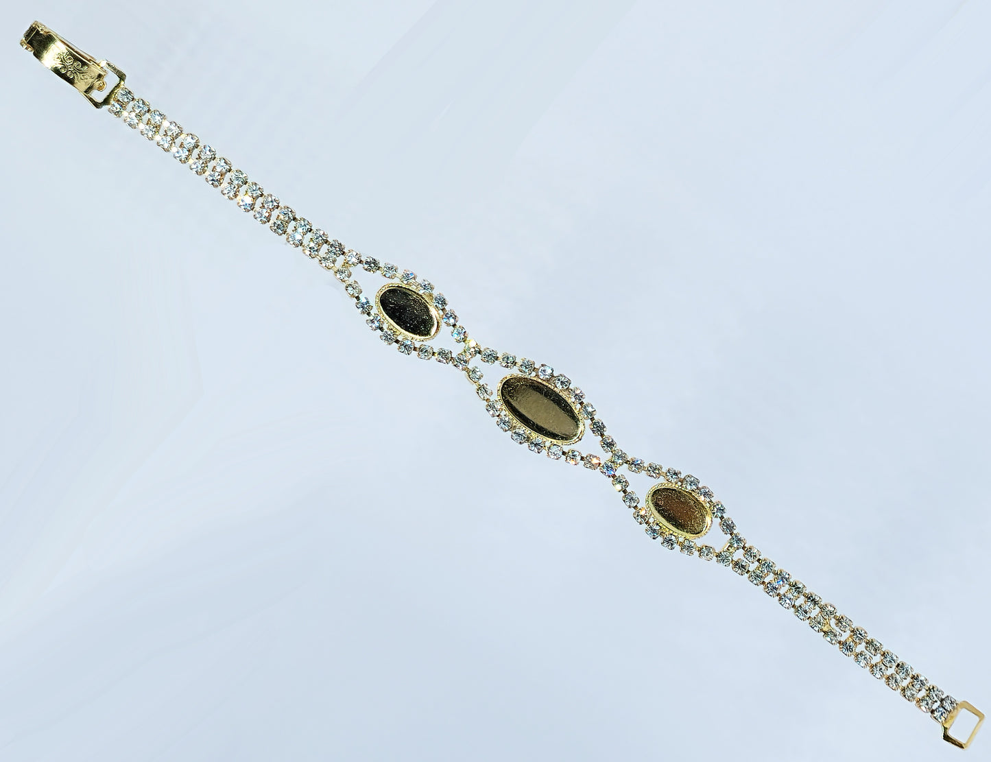 54231.0 - Gold Plated bracelet with Swarovski Rhinestones and 14x7 mm and 10x6 mm cupsup for cabochon stone