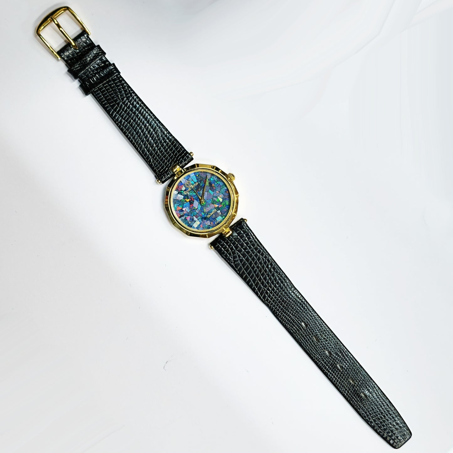 03680.0 - "Opal Time" Watch Natural Australian Opal No numbers No seconds hand Gold color Black leather band Japanese movement