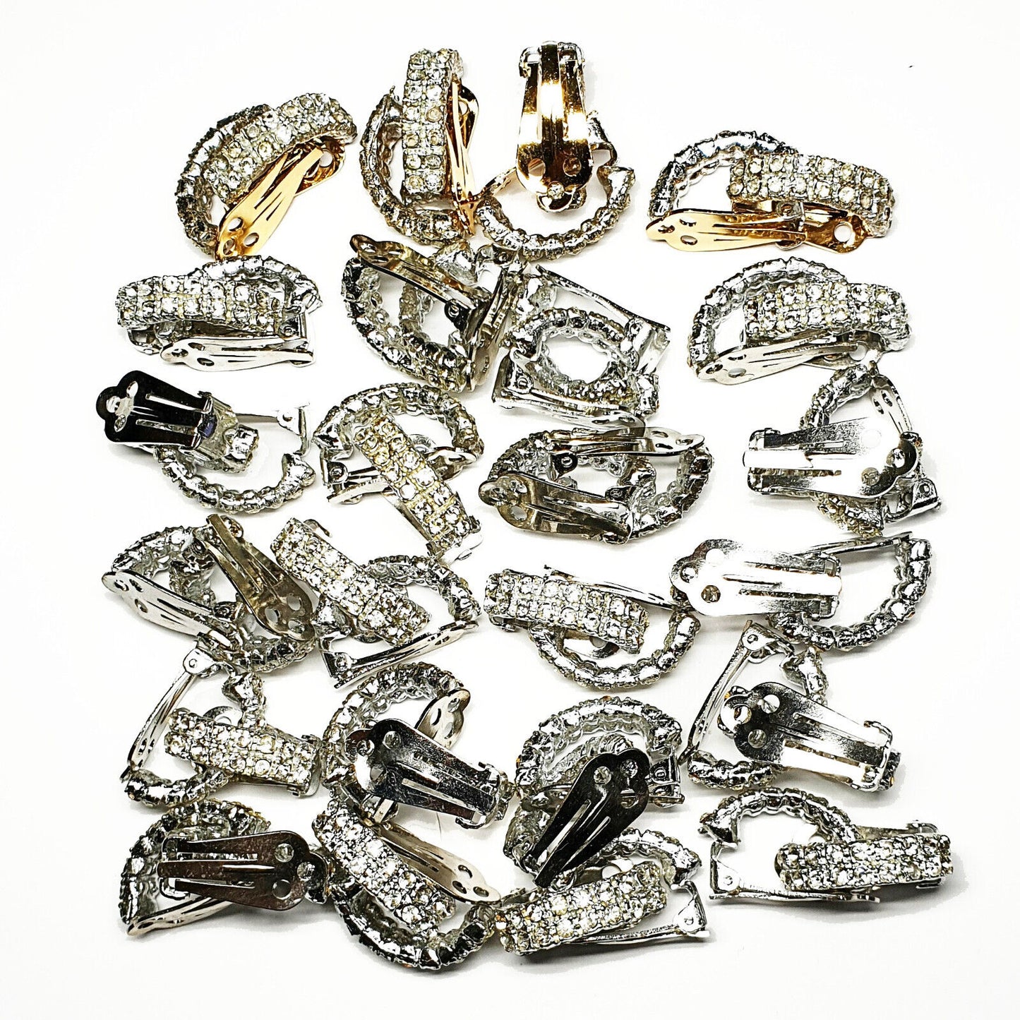 08786 - 24 Pairs of Silver Coloured Clip On Earrings + Clear Rhinestone Crystals