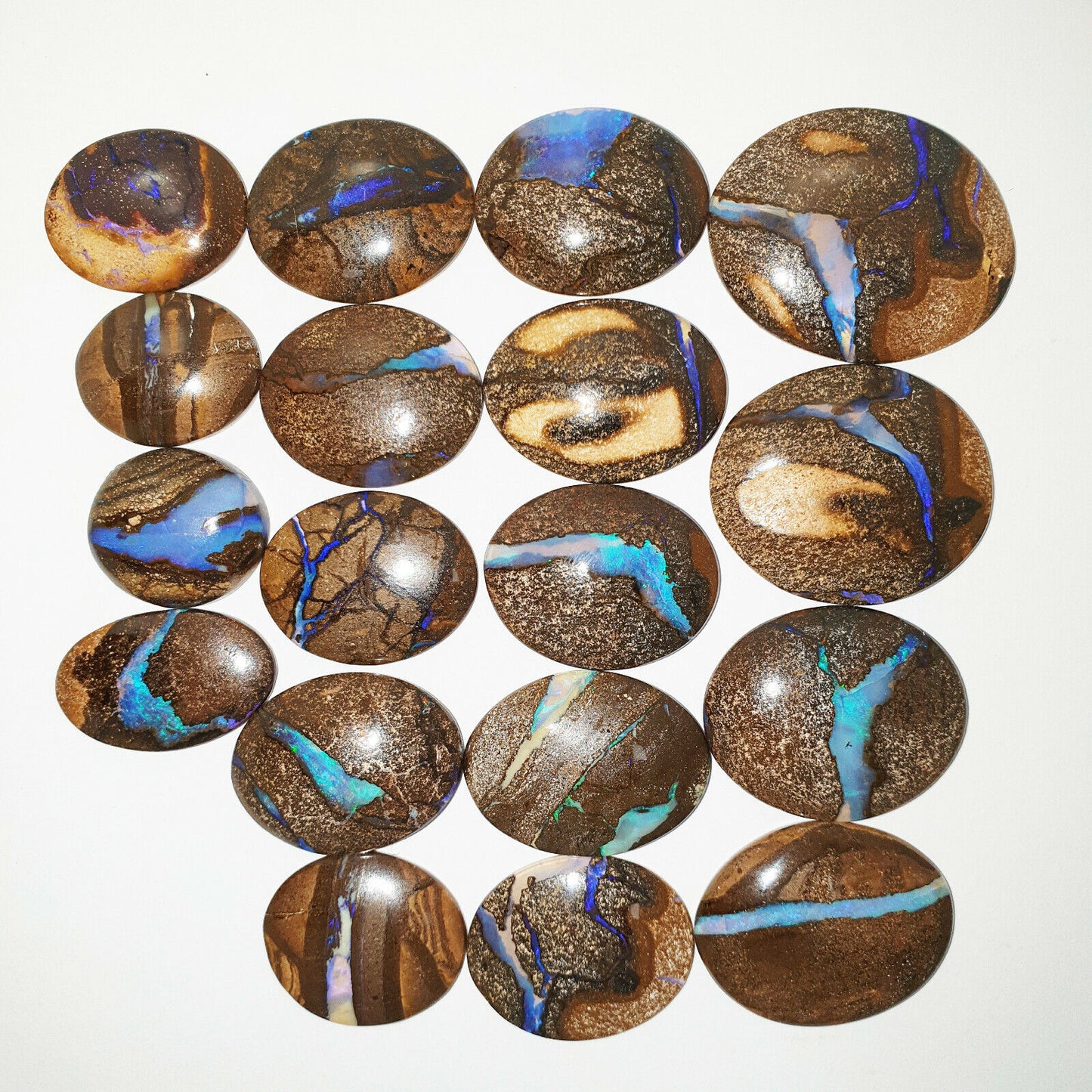 53464 - 18 Oval Cut Australian Boulder Opal with Blue Veins from 17x15 mm and up