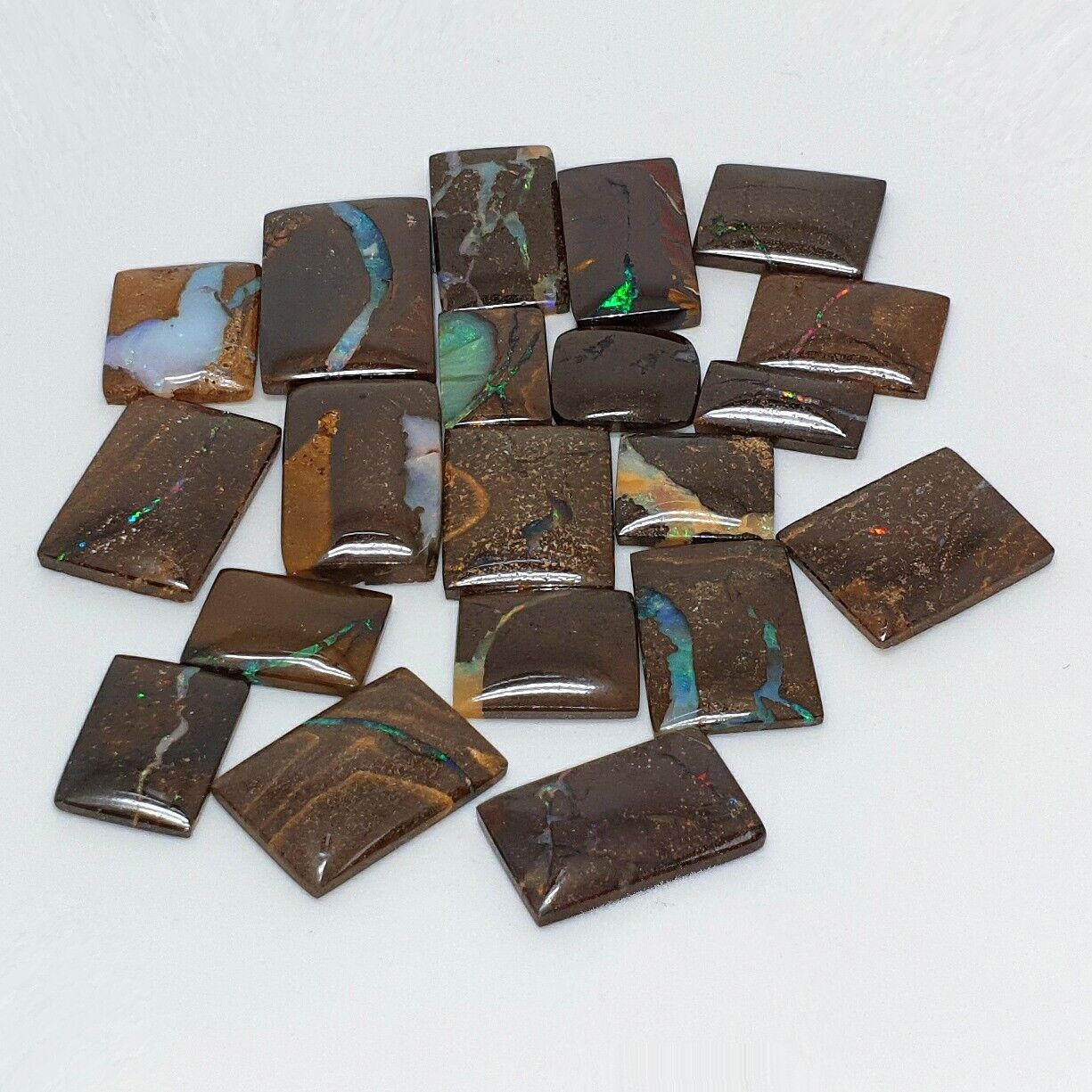 53463 - 20 Highly Polished Rectangular Boulder Opal with Coloured Vein of Opal