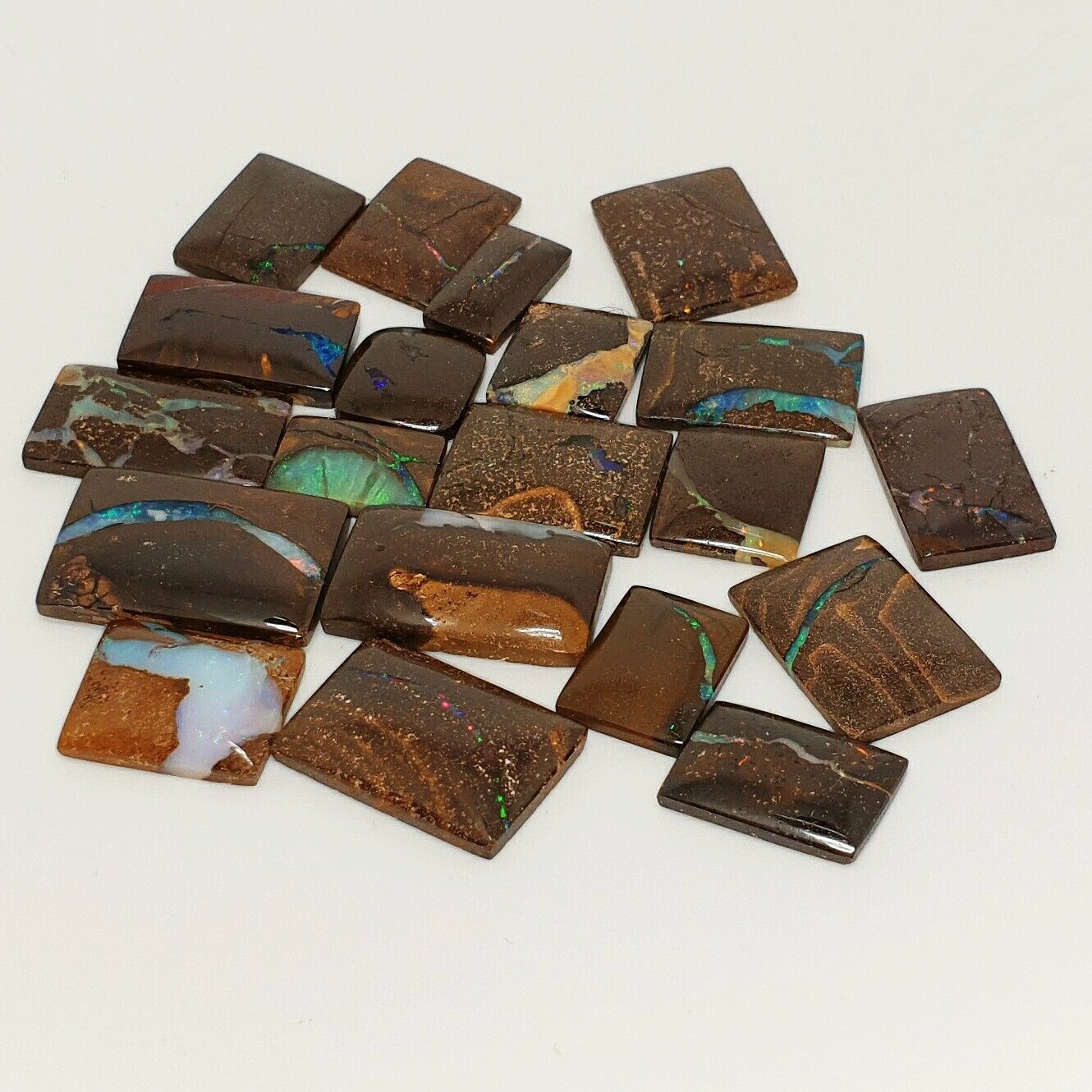 53463 - 20 Highly Polished Rectangular Boulder Opal with Coloured Vein of Opal