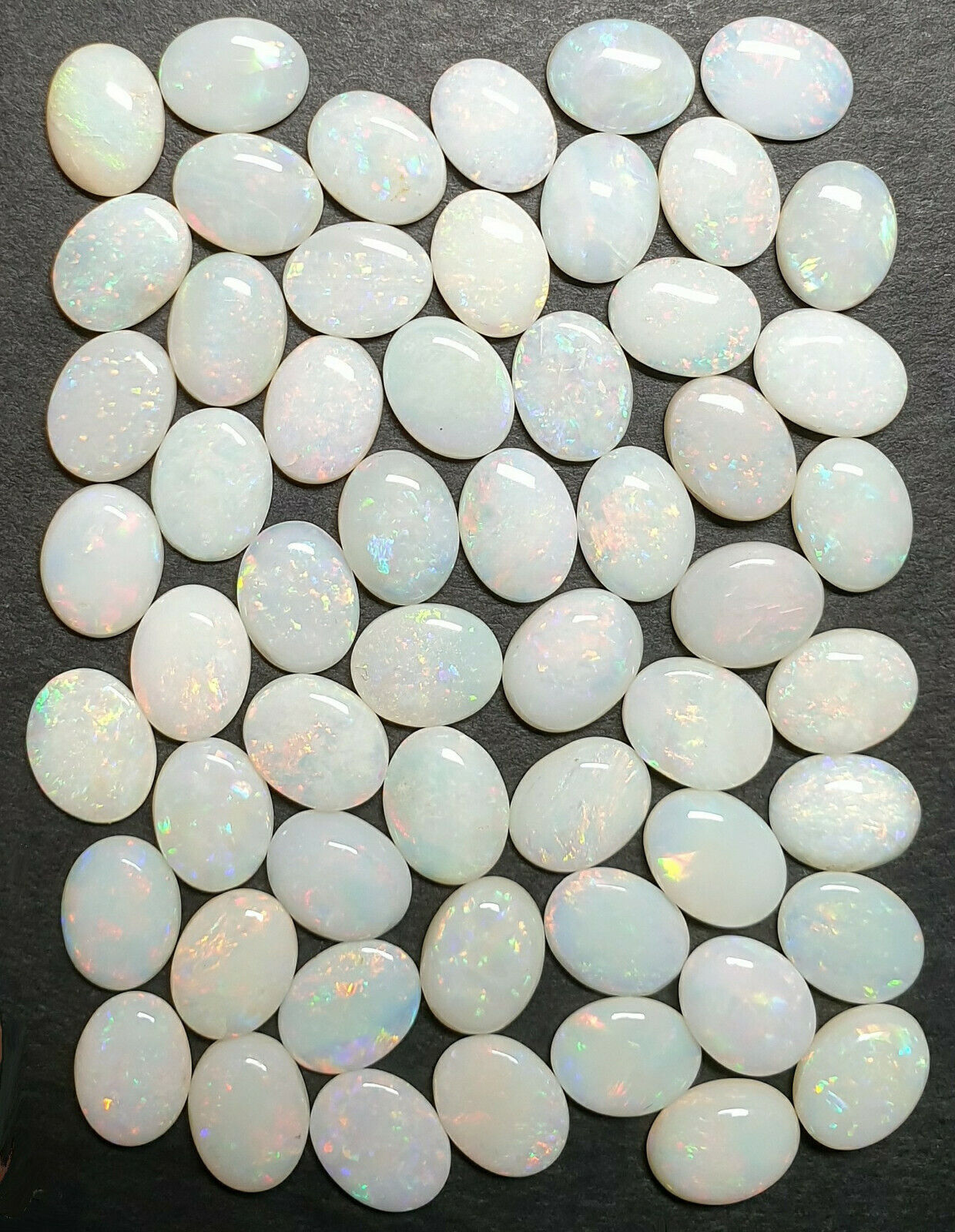 53521 - 56 Australian Natural Earth Mined Coober Pedy White Opal 9x7 mm Oval