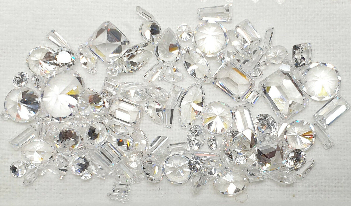52272 - 125 CZ Replacement stones for setter or workshop Mixed sizes and shapes