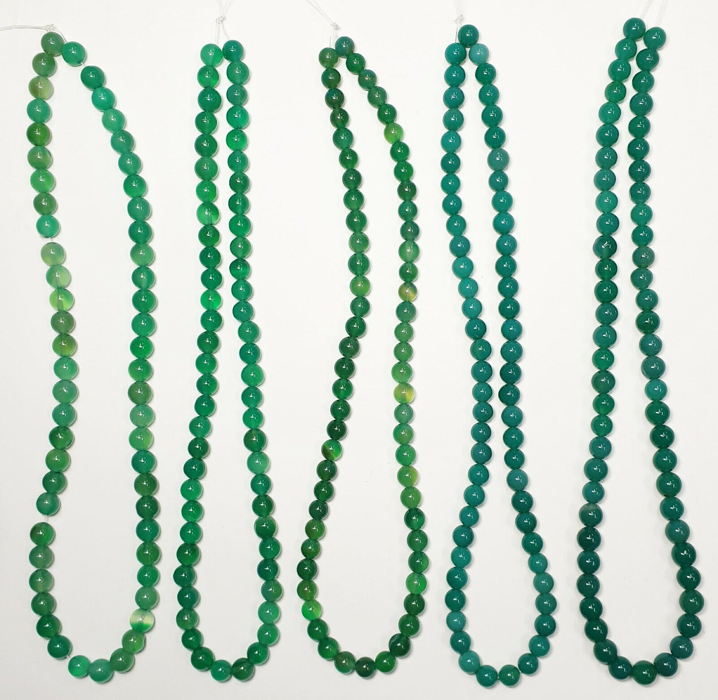 53393 - 20 Strands 7.5 - 8.5 mm Dyed Green Agate Beads Temporarily Strung 40 cm