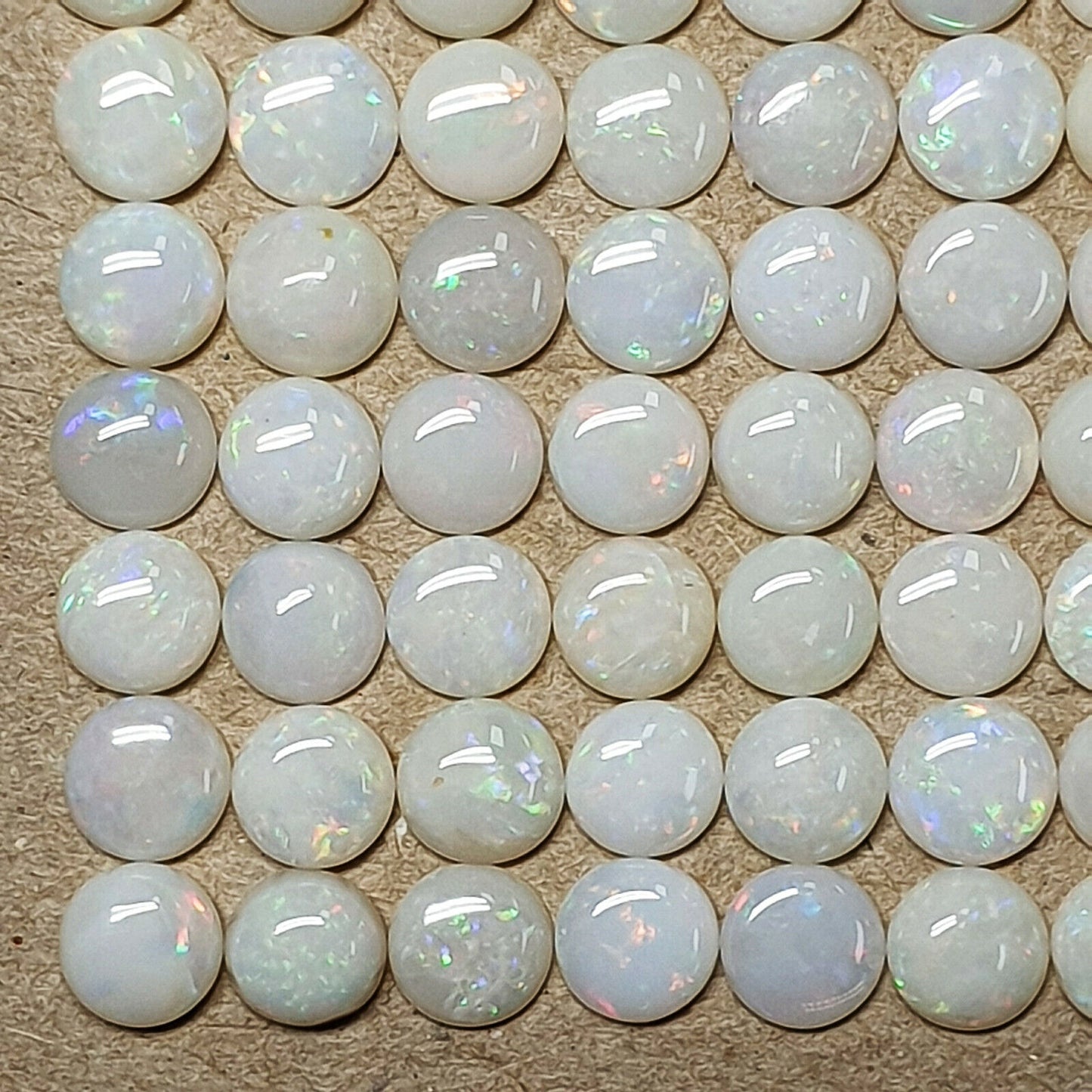 52161 - 100 pieces 5mm Round Cut Natural Australian Solid White Opal, 31 carats