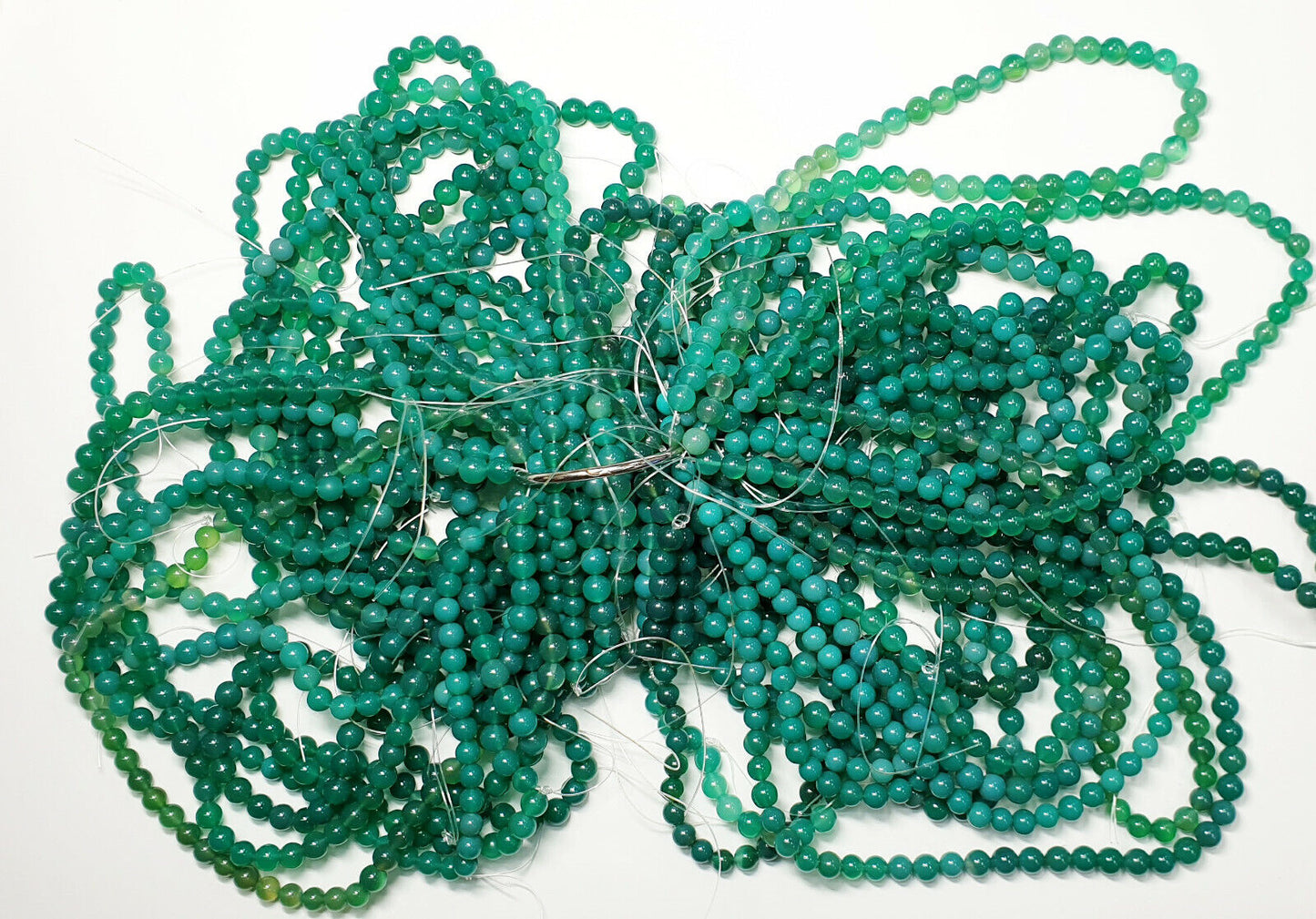 53394 - 20 Strands 6.5 - 7.5 mm Dyed Green Agate Beads Temporarily Strung 40 cm