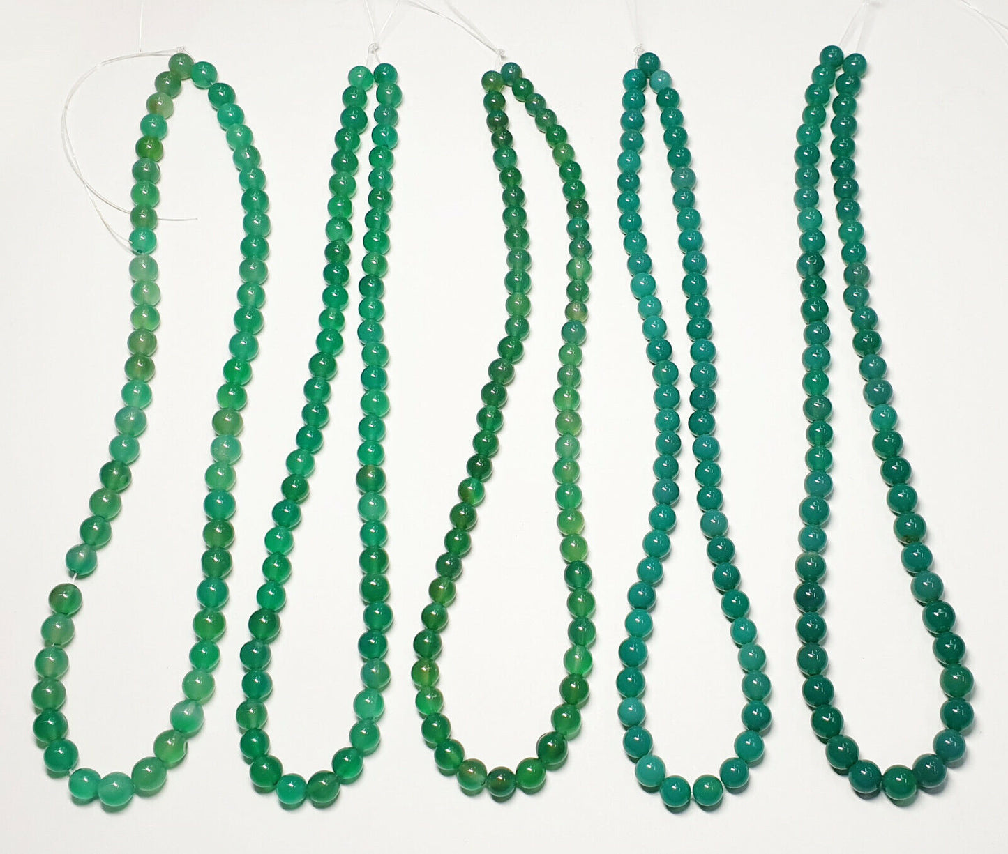 53394 - 20 Strands 6.5 - 7.5 mm Dyed Green Agate Beads Temporarily Strung 40 cm