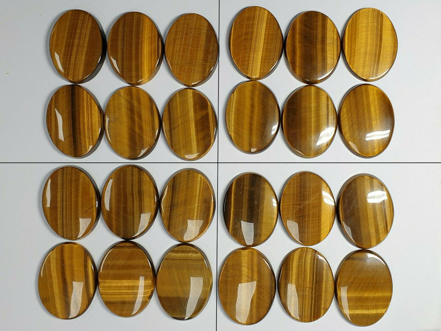 11594 - 6 Tiger's Eye 40x30 mm Oval Cut Slight Cabochon and Flat Polished Back