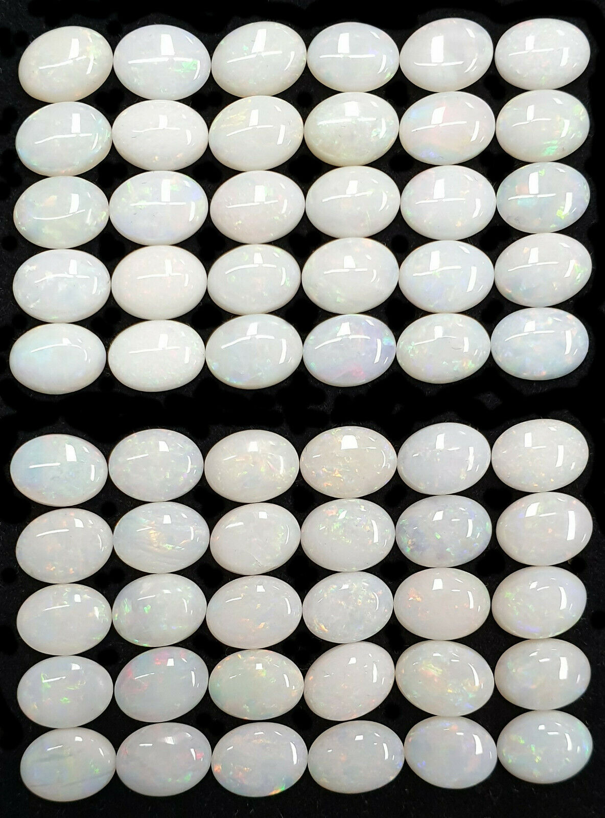 52251 - 30 Australian Earth Mined Coober Pedy Solid White Opals 8x6 mm Oval Cut