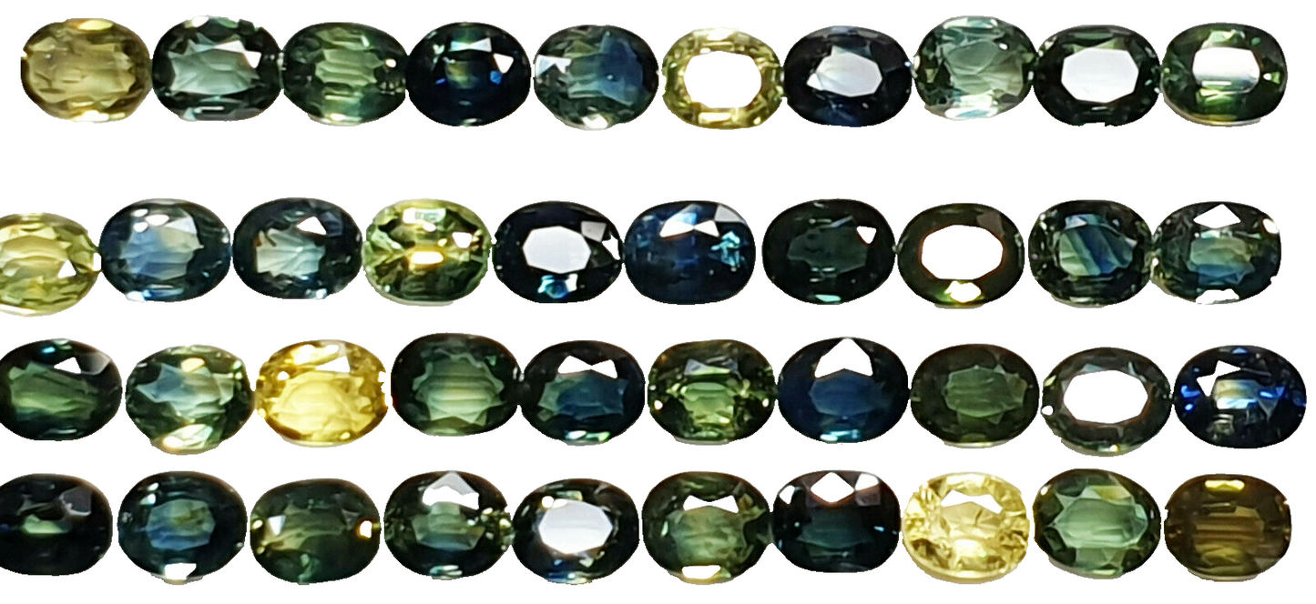 52219 - 40 Oval Cut Aussie Teal, Green, Yellow, Parti Color Sapphires 19.47 cts