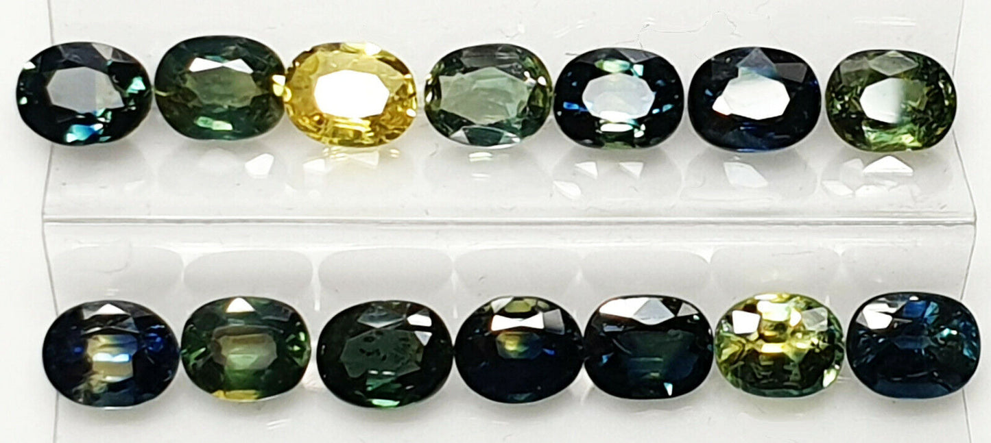 52219 - 40 Oval Cut Aussie Teal, Green, Yellow, Parti Color Sapphires 19.47 cts