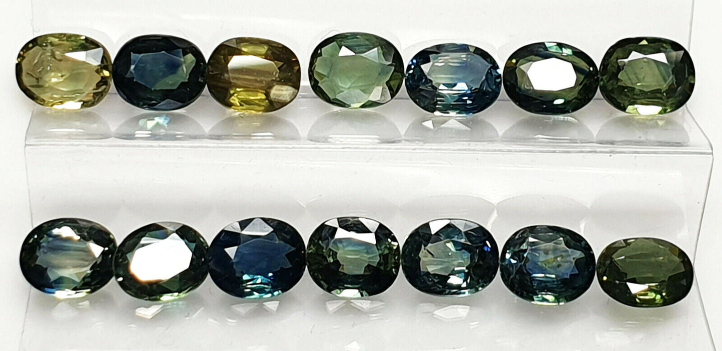 52219 - 40 Oval Cut Aussie Teal, Green, Yellow, Parti Color Sapphires 19.47 cts