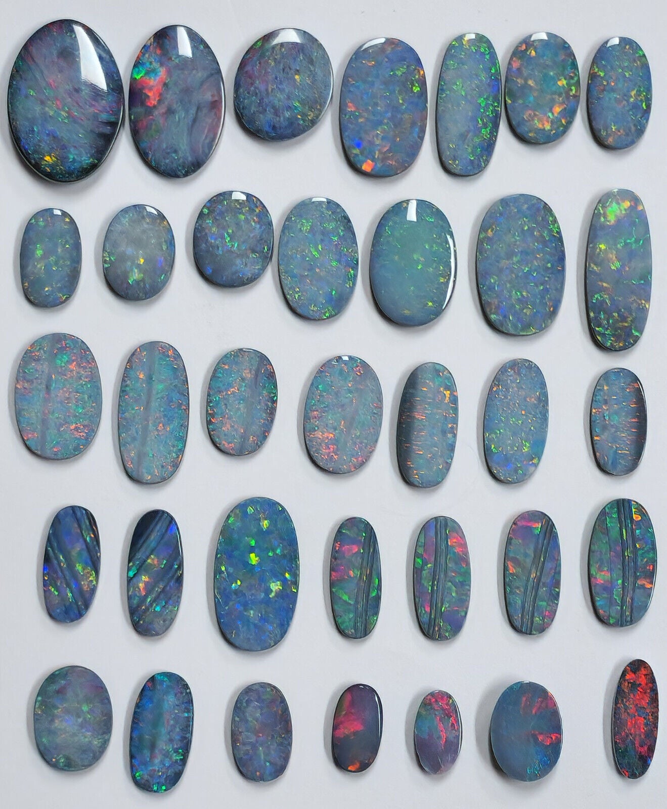 54100.0 - EB - 4 lots of Oval cut NaturalAustralian Opal doublets in mixed sizes