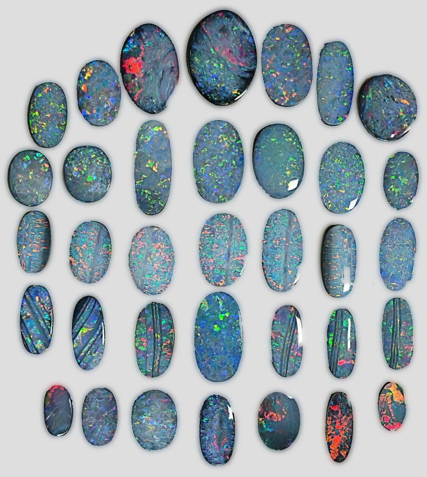 54100.0 - EB - 4 lots of Oval cut NaturalAustralian Opal doublets in mixed sizes
