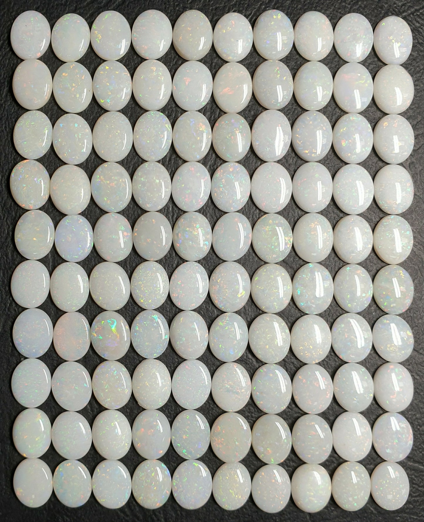 53511.0 - 10x8 mm Engros Lott på 25 stykker Naturlig australsk Solid White Opal fra Coober Pedy Til salgs Hver lot er ca 34 karat