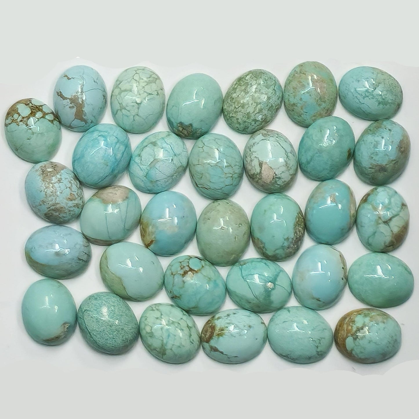 54166.0 - 11x9 mm Oval Cabochon Cut Natural Earth Mined Non-treated Australian Turquoise, this "TurqOZ" is rare and was mined in the 1970's