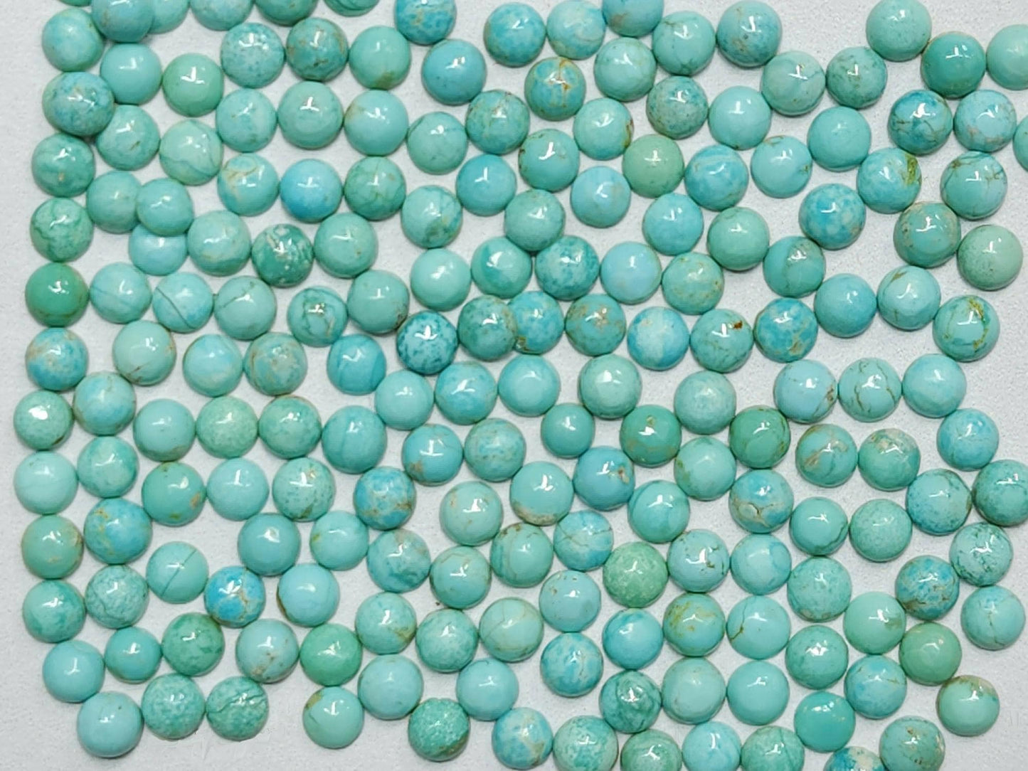 50002.5 - 2.5 mm Round Cut Turquoise Cabochons Very Rare Natural Untreated Australian 'TurqOZ' for sale at Wholesale Quantities and Prices