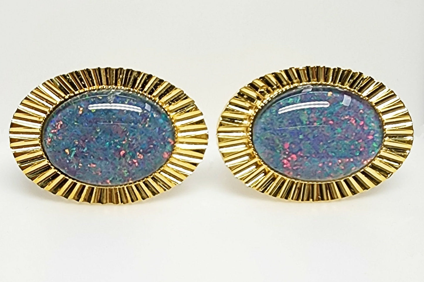 01693.0 - Diamond Cut metal Gold Plated Cuff Links set with 18 x 13 mm Oval Cut Opal Triplets made in Australia with Natural Australian Opal