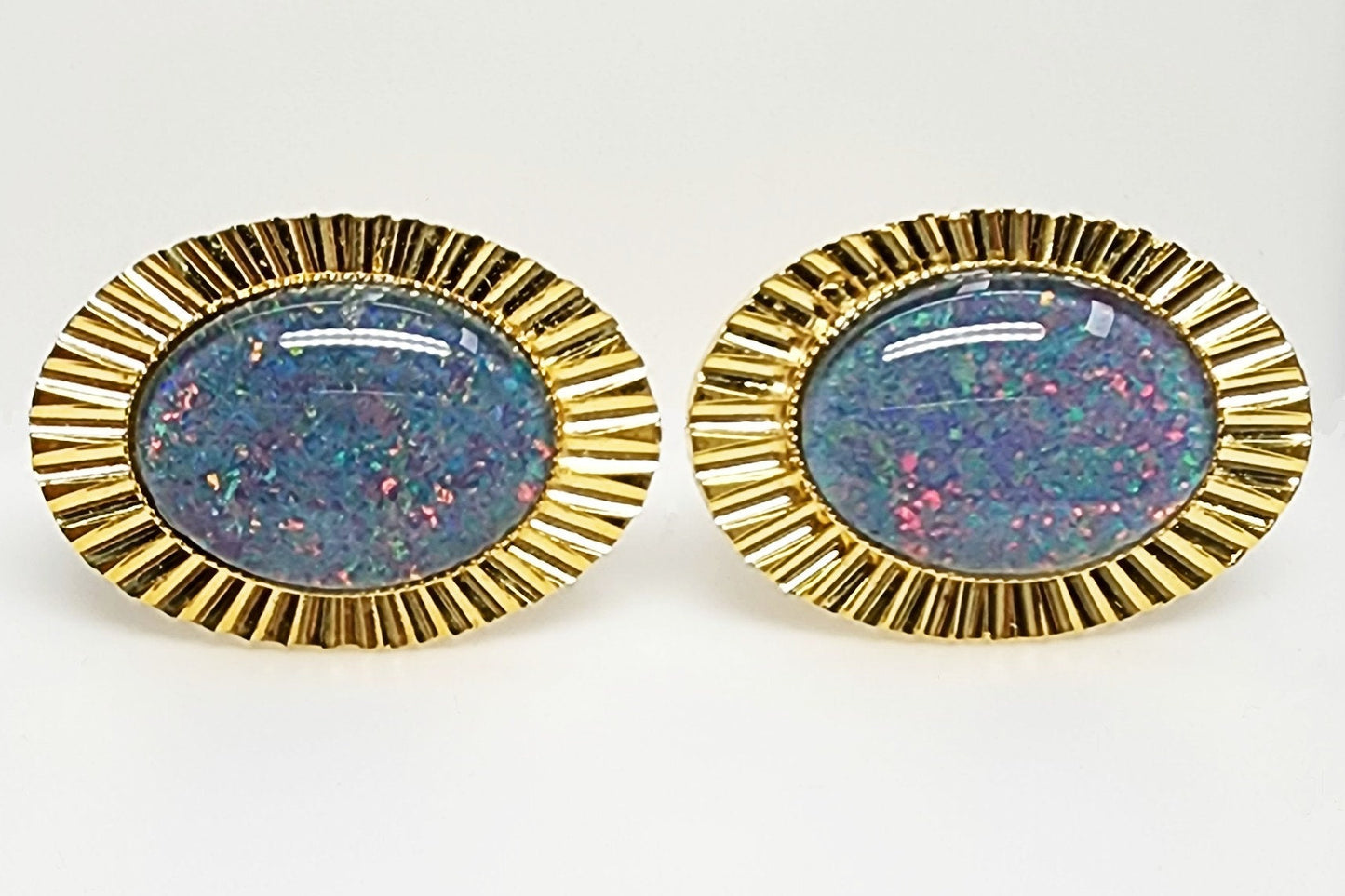01693.0 - Diamond Cut metal Gold Plated Cuff Links set with 18 x 13 mm Oval Cut Opal Triplets made in Australia with Natural Australian Opal