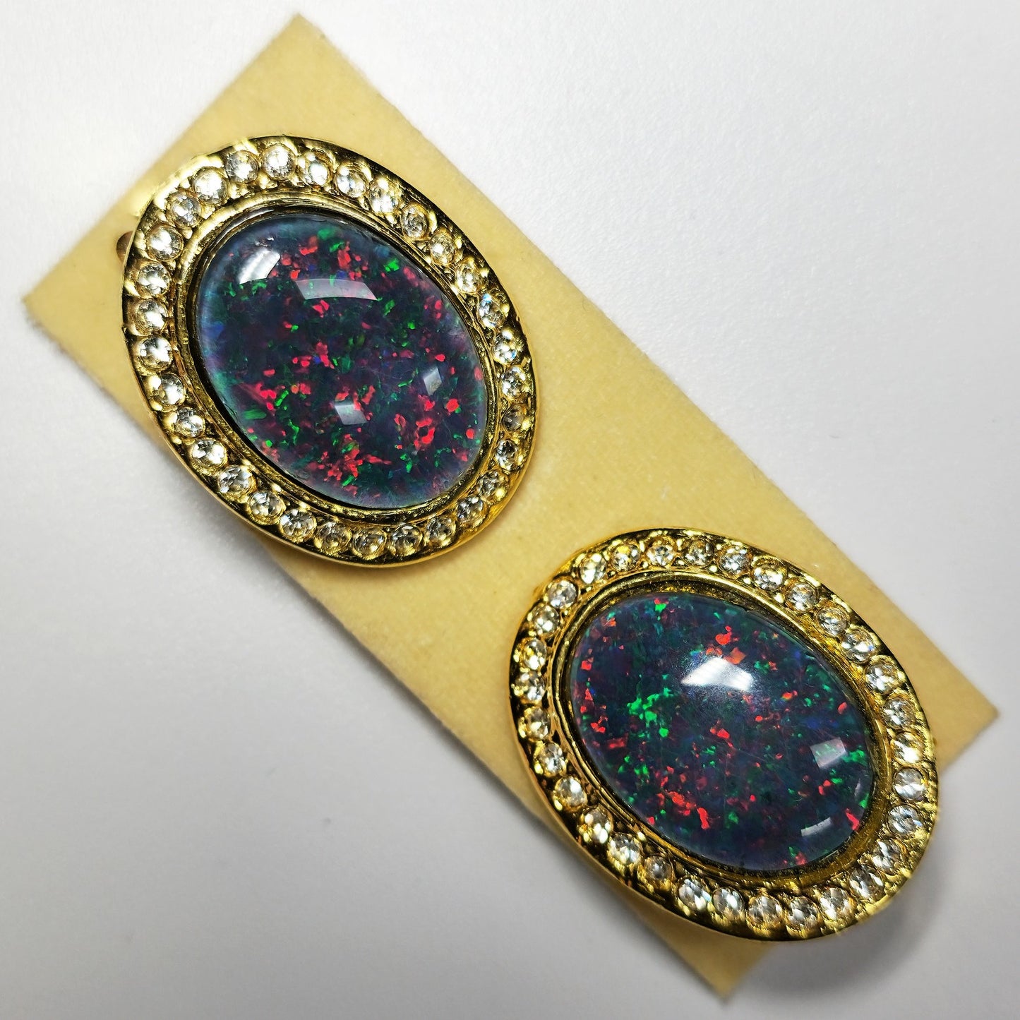 03306.0 - Pair of large 25x20 mm Gold Plated Clip on Earrings set with 18x13 mm Australian Opal Triplet surrounded with Rhinestones for sale