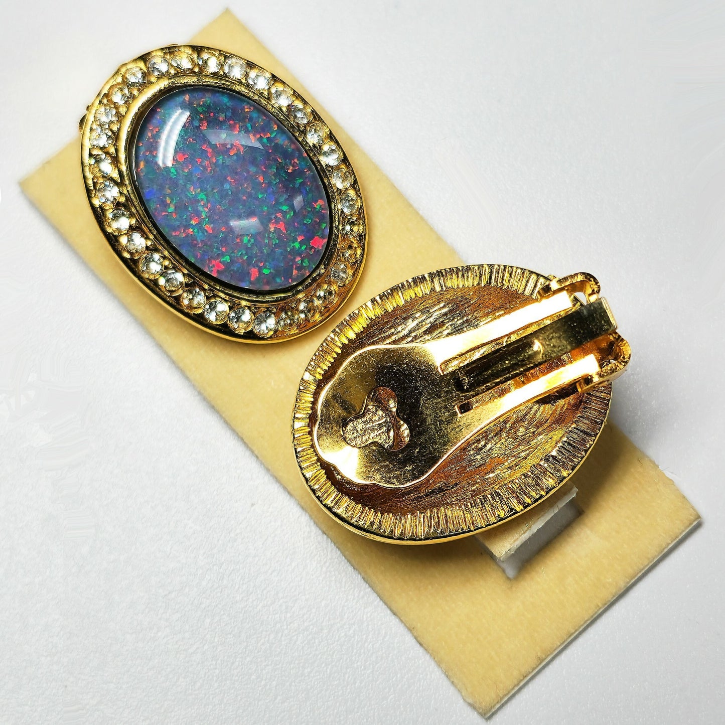 03306.0 - Pair of large 25x20 mm Gold Plated Clip on Earrings set with 18x13 mm Australian Opal Triplet surrounded with Rhinestones for sale
