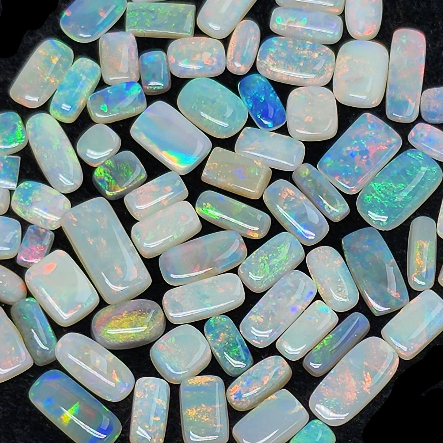 53952.0 - One Wholesale Lot of 70 Pieces Mixed Sizes and Mixed Qualities Australian Cushion and Baguette Cut Solid White Opal 37.31 Carats