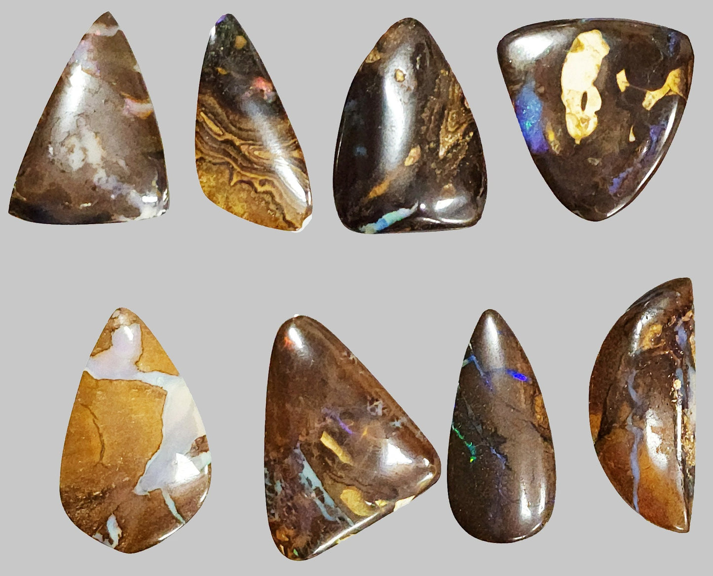 54103.0 - Australian Queensland Boulder Opal Free shaped cut 30 pieces Large stones 20 - 40mm long x 15 - 30mm wide 839.4 cts Select pieces