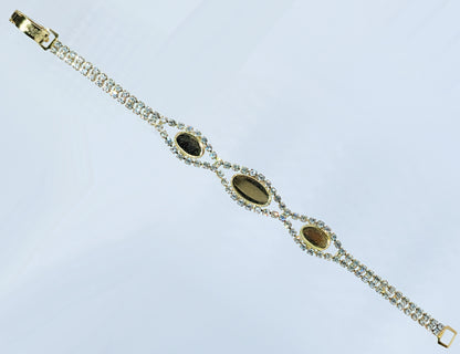 54231.0 - Gold Plated bracelet with Swarovski Rhinestones and 14x7 mm and 10x6 mm cups for cabochon stone
