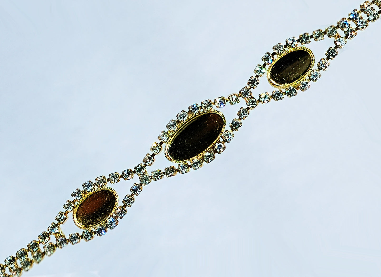 54231.0 - Gold Plated bracelet with Swarovski Rhinestones and 14x7 mm and 10x6 mm cupsup for cabochon stone
