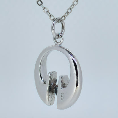 07745.0 - Sterling Silver Pendant set with either a blue or a teal coloured 4.25 mm about 0.50 carat natural Australian Sapphire 22 mm high