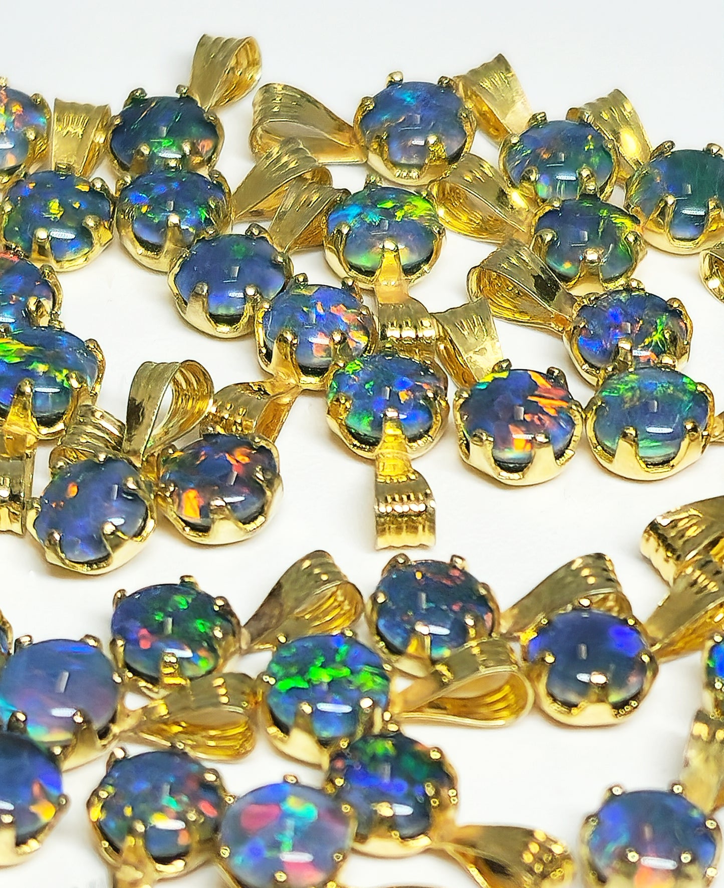 04392. Sterling Silver Gold Plated Opal Triplet Pendants