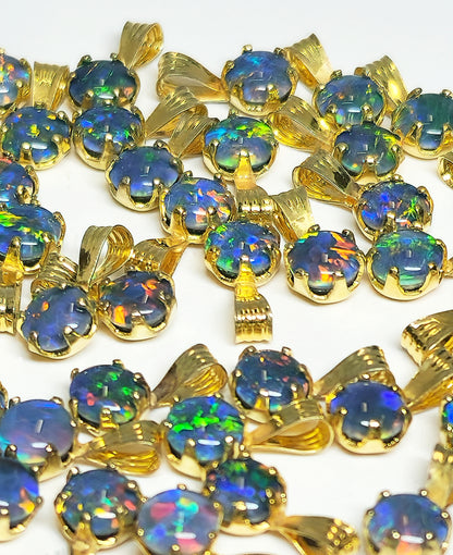 04392. Sterling Silver Gold Plated Opal Triplet Pendants