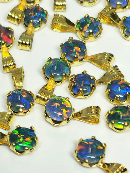 04392. Sterling Silver Gold Plated Opal Triplet Pendants