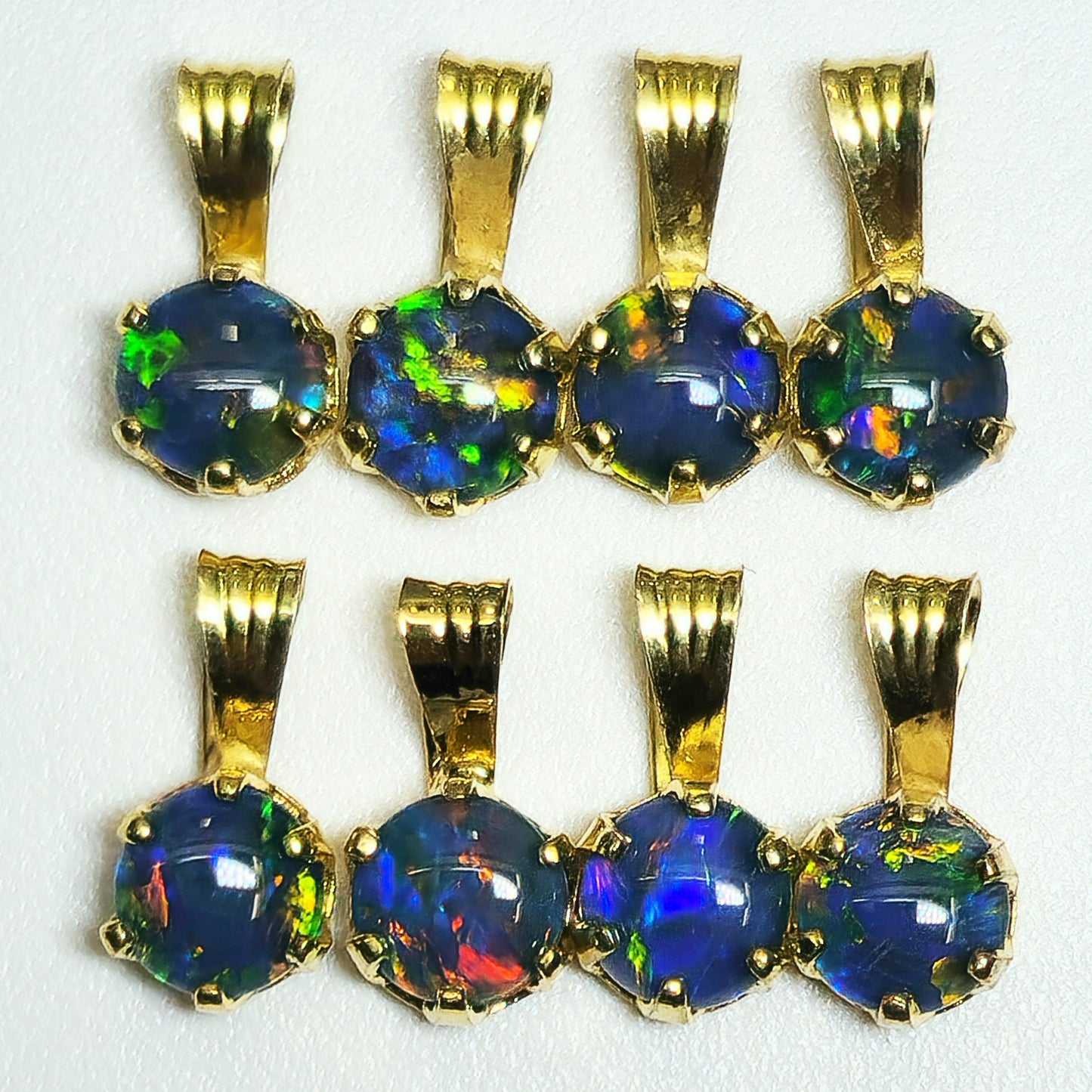 04392. Sterling Silver Gold Plated Opal Triplet Pendants