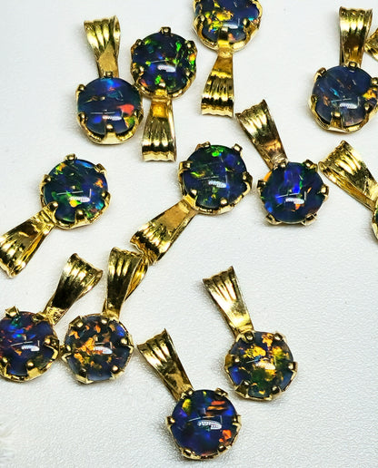04392. Sterling Silver Gold Plated Opal Triplet Pendants