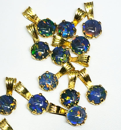04392. Sterling Silver Gold Plated Opal Triplet Pendants
