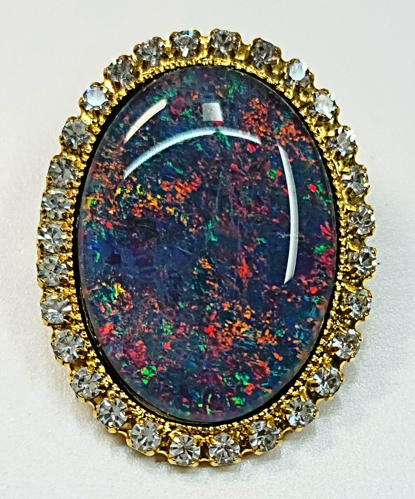 53662. Gold plated Brooch, with Swarovski Rhinestones, Large Size 25 x 18 mm Oval Cut Australian Opal Triplet