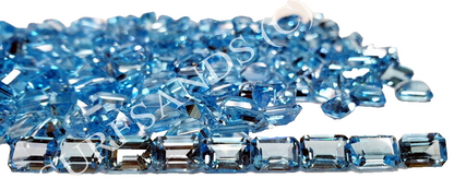 15364 - Emerald cut Blue Topaz 7 x 5 mm Wholesale Lot 55 Pieces About 65 Carats