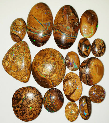 53467 -     16 Oval Cut Golden Boulder Opal Matrix About 13 x 9 mm to 26 x 23 mm