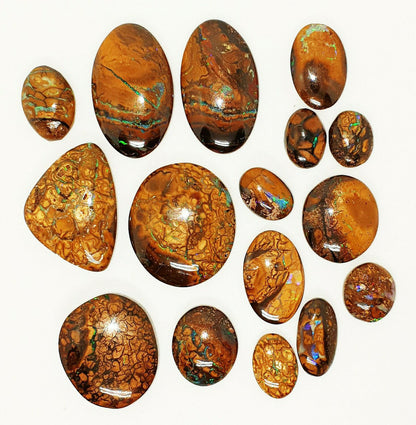 53467 -     16 Oval Cut Golden Boulder Opal Matrix About 13 x 9 mm to 26 x 23 mm