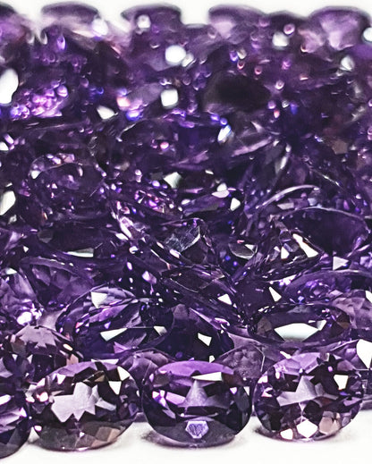 15367 - One Wholesale Lot of 55 pieces 9x7 mm Oval Cut Purple Amethyst for sale