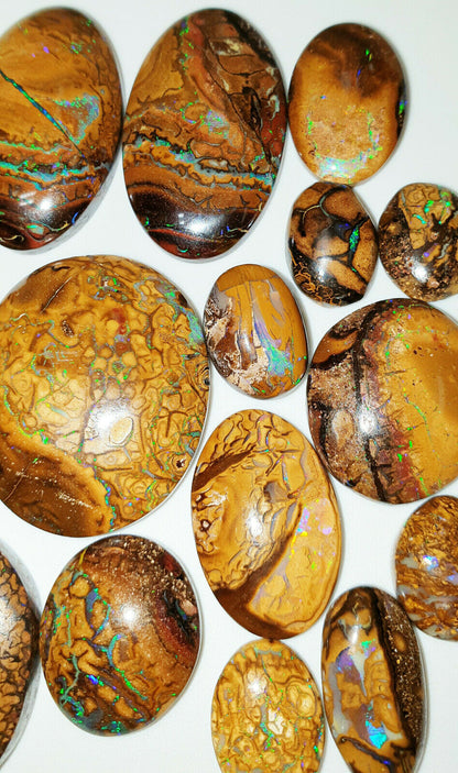 53467 -     16 Oval Cut Golden Boulder Opal Matrix About 13 x 9 mm to 26 x 23 mm