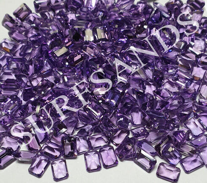 15366 - One Lot 66 Pcs 7x5 mm Emerald Cut Amethyst (Approx. 58 carats) for sale