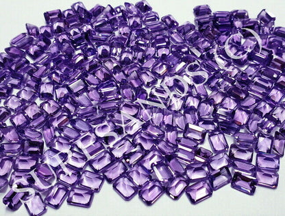 15366 - One Lot 66 Pcs 7x5 mm Emerald Cut Amethyst (Approx. 58 carats) for sale