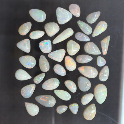 54123.0 - 39 pieces Natural Australian White Opals from 6x5 to 11x6 mm 30.23 cts