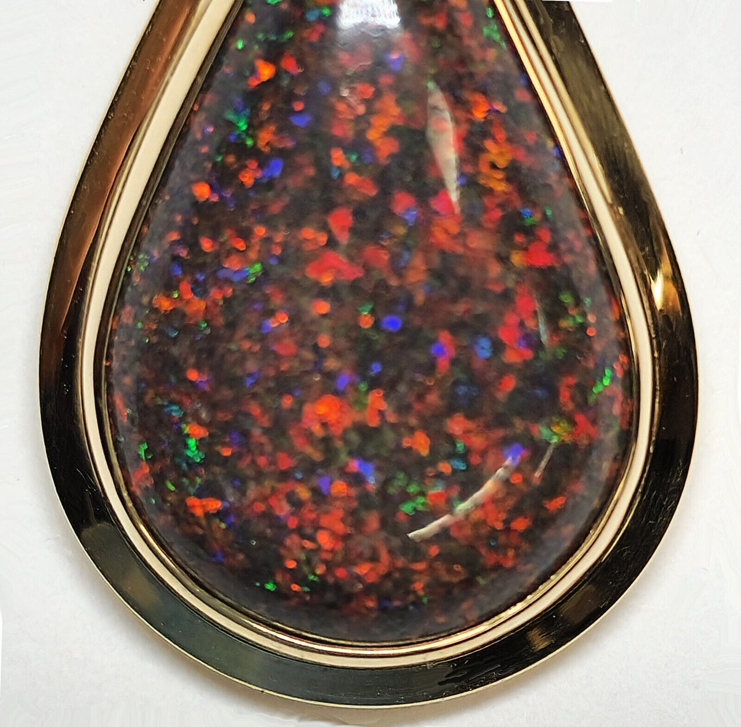 03912.0 - 14 Kt Yellow Gold pendant 30x15 mm With Treated Australian Opal Matrix