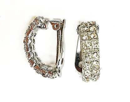 08786 - 24 Pairs of Silver Coloured Clip On Earrings + Clear Rhinestone Crystals