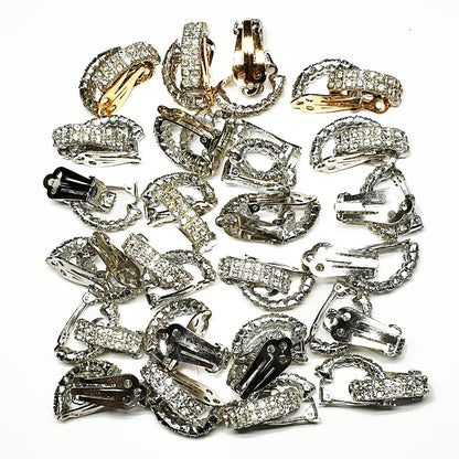 08786 - 24 Pairs of Silver Coloured Clip On Earrings + Clear Rhinestone Crystals