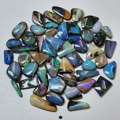 54156.0 - 50 Small Boulder Opal Free Cut Polished Faces 56.46 cts 6 - 14 mm High